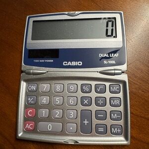 Casio SL-100L pocket Calculator - New solar